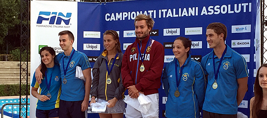 Maicol Verzotto sul podio con l'azzurra Tania Cagnotto